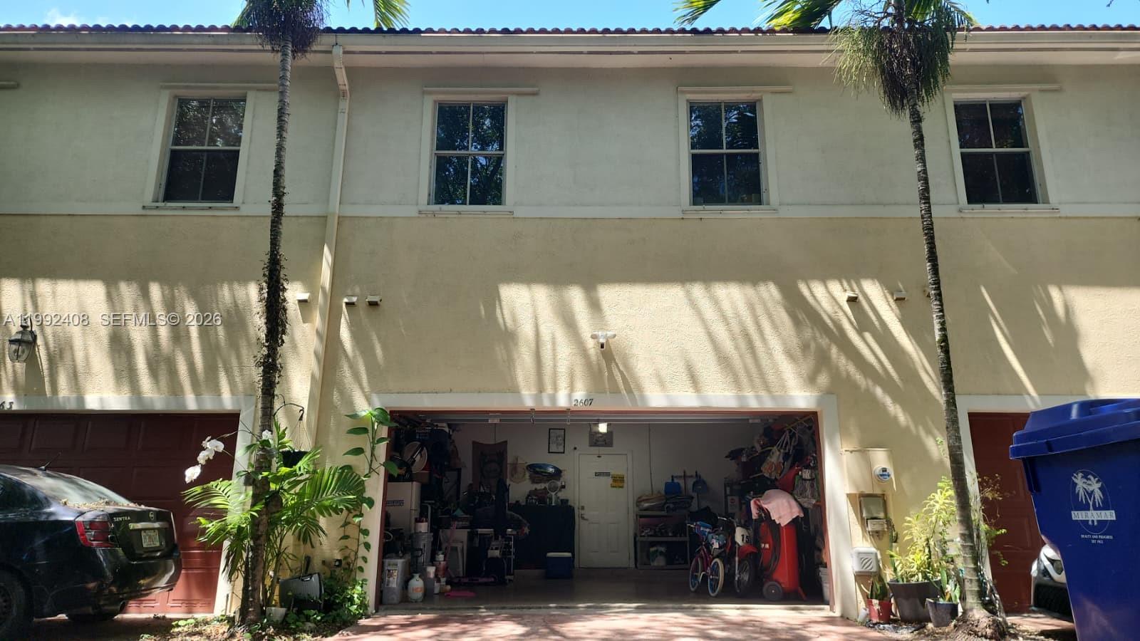 2607 Southwest 99th Way Miramar, FL 33025 - Photo 43 of 50 a front view of a house