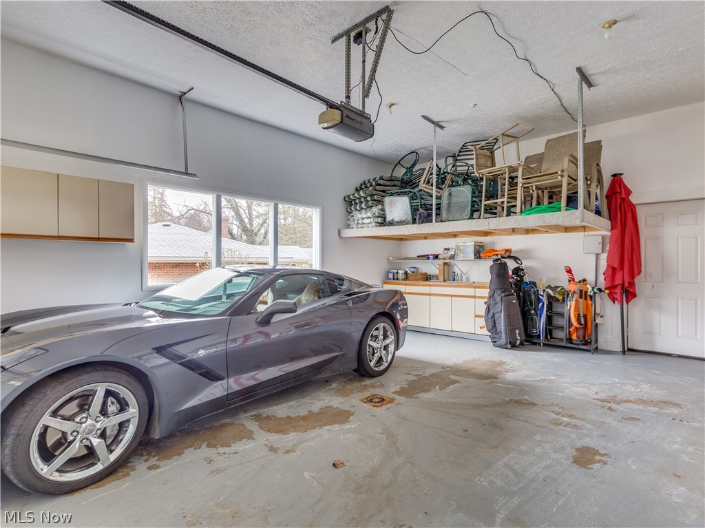 3096 Stanley Road Akron, OH 44333 - Photo 25 of 35 Oversized 2 car garage with extra storage, Hot and Cold water and drain