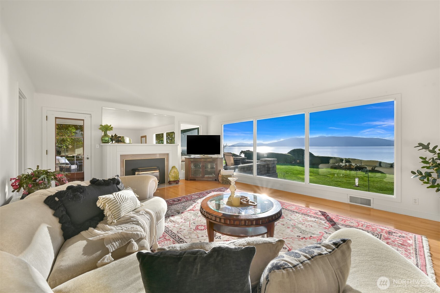 100 Willow Road Bellingham, WA 98225 - Photo 12 of 40 a living room with furniture and a floor to ceiling window