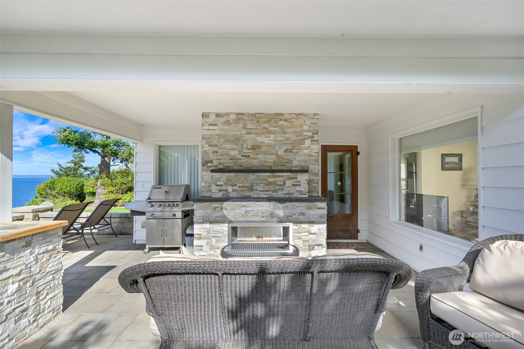 100 Willow Road Bellingham, WA 98225 - Photo 16 of 40 a living room with furniture and a floor to ceiling window