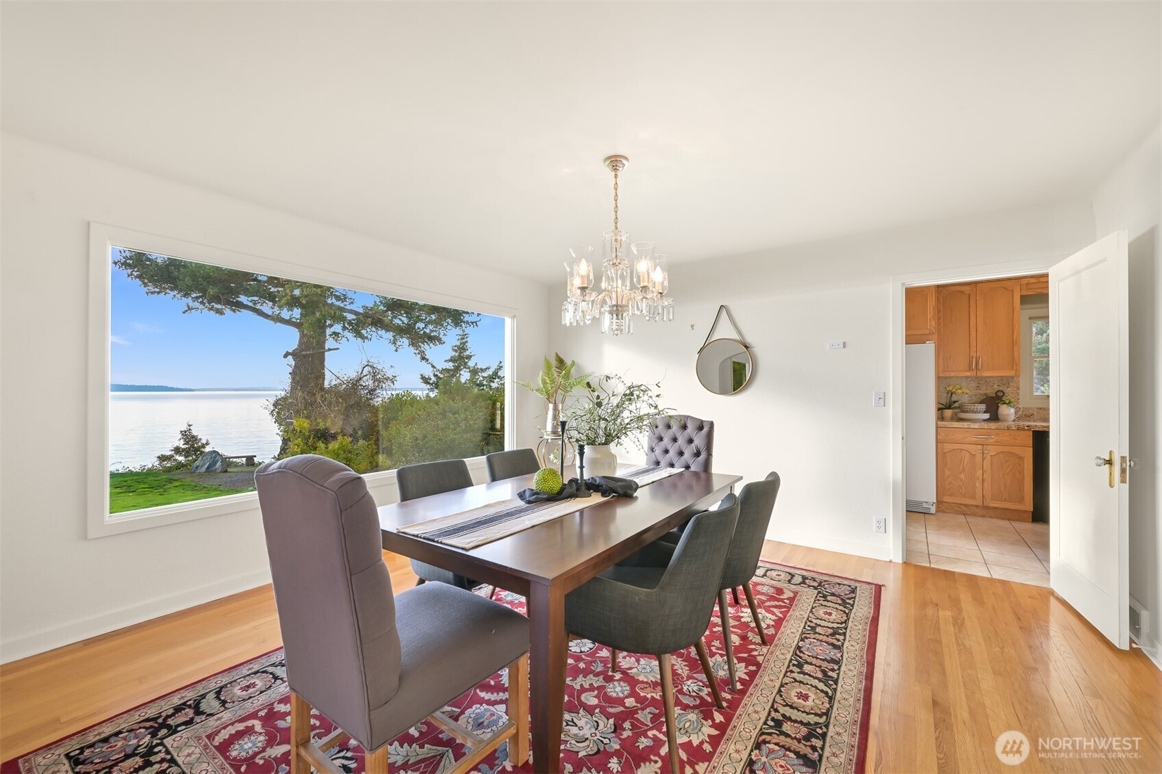 100 Willow Road Bellingham, WA 98225 - Photo 18 of 40 a dining room with furniture a rug and wooden floor