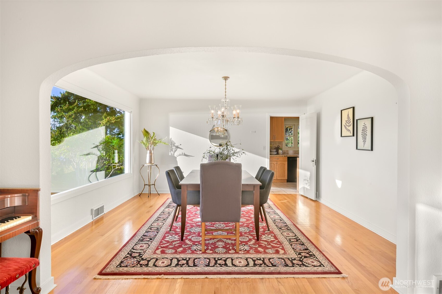 100 Willow Road Bellingham, WA 98225 - Photo 19 of 40 a dining room with wooden floor and a rug