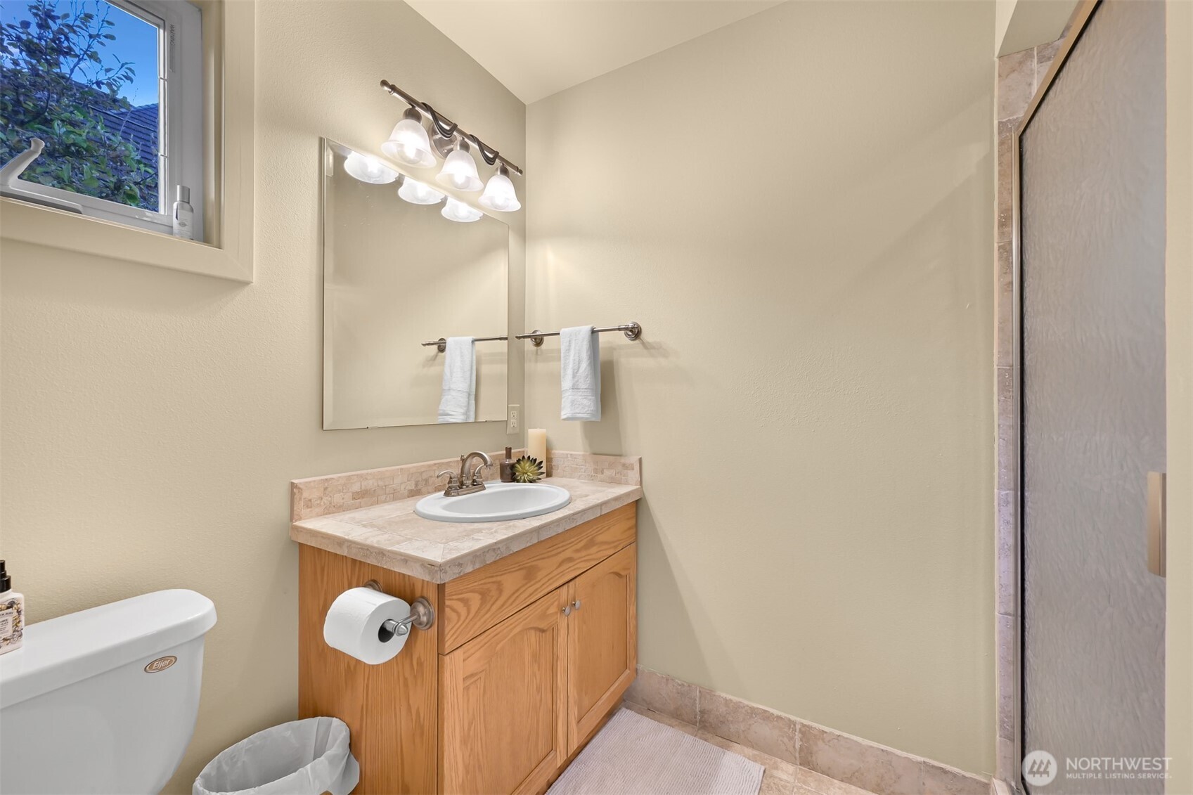100 Willow Road Bellingham, WA 98225 - Photo 28 of 40 a bathroom with a toilet sink and mirror