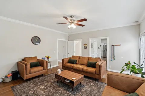 a living room with furniture and a couch