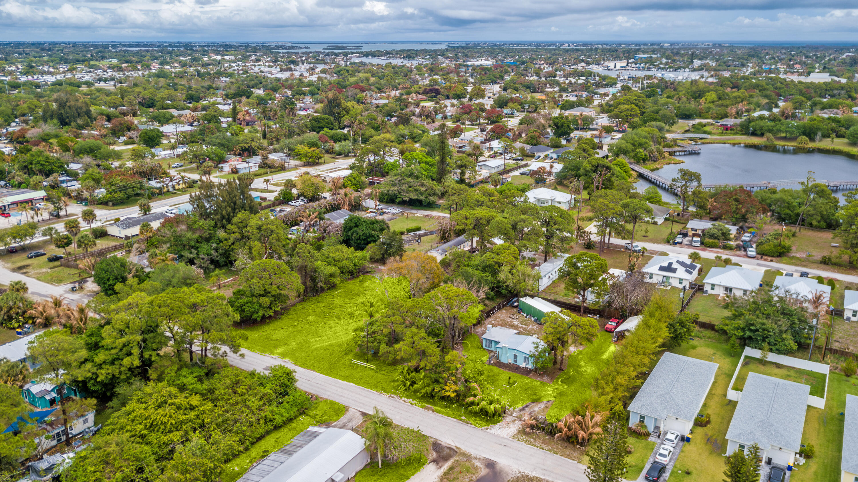 5167 Southeast Isabelita Avenue Stuart, FL 34997 - Photo 5 of 9 an aerial view of residential houses with outdoor space