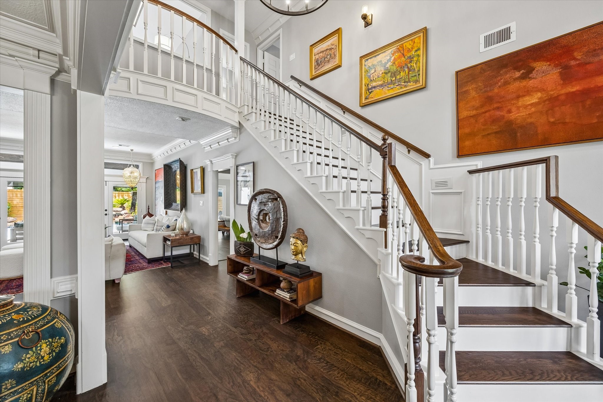 146 Golden Shadow Circle Spring, TX 77381 - Photo 5 of 41 The graceful stairway creates a stunning focal point in the front entry, setting the tone for the home’s timeless design and welcoming atmosphere.