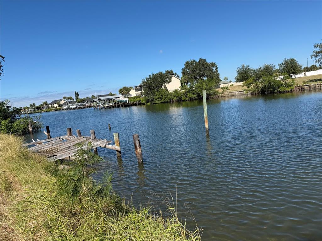 a view of swimming pool next to a lake view