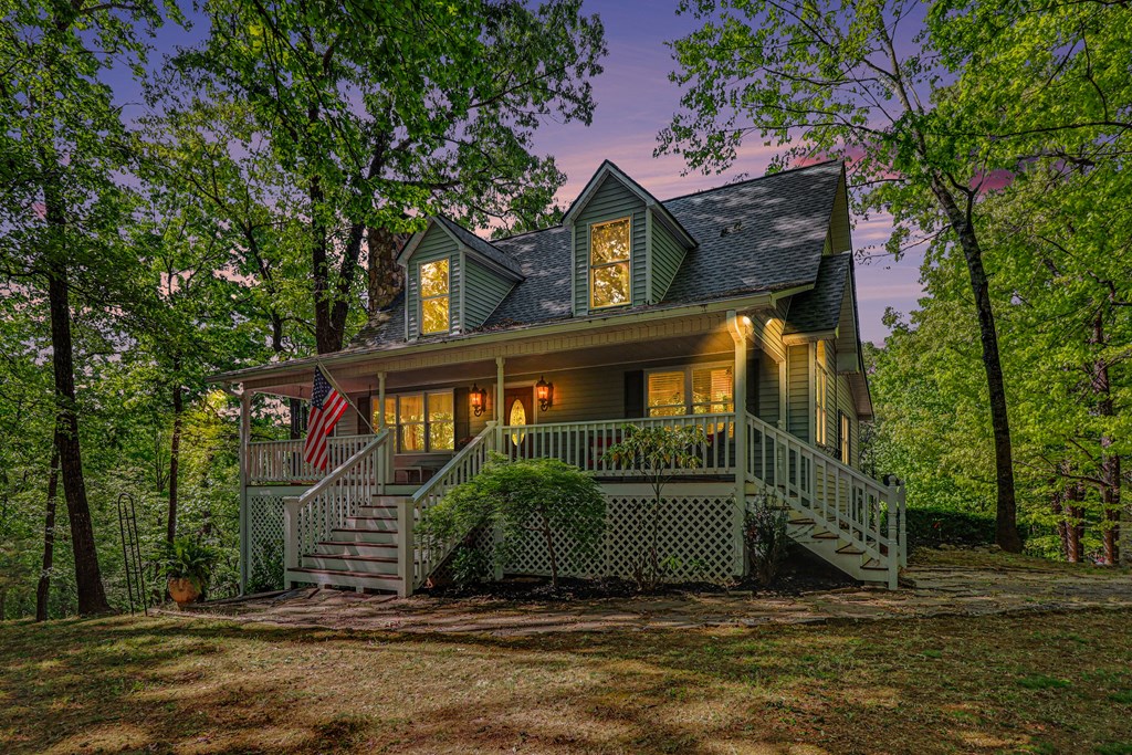 1136 Timber Ridge Lane Ellijay, GA 30540 - Photo 36 of 36 a front view of a house with a garden