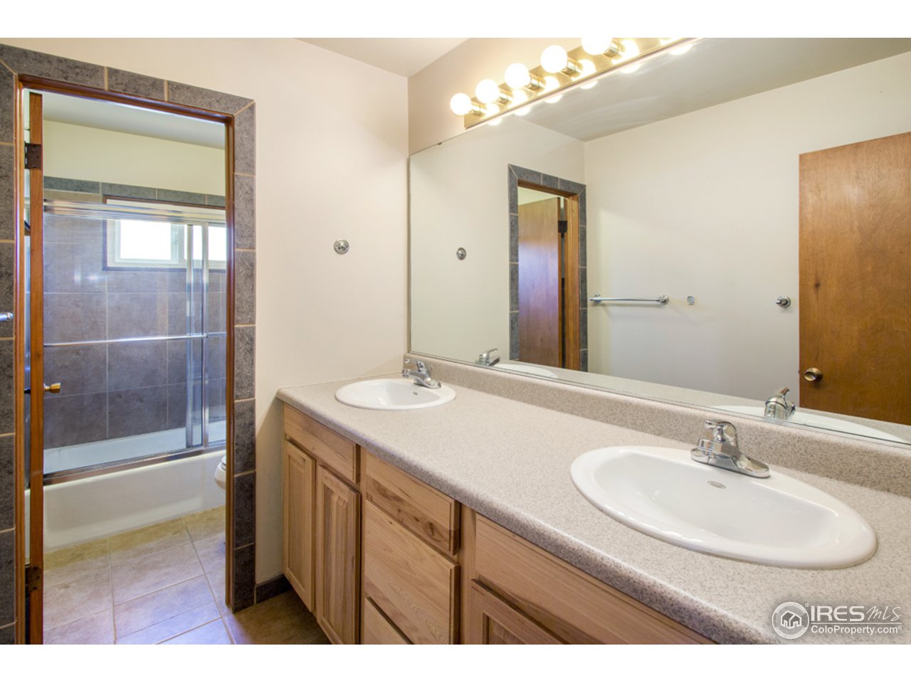 913 Rocky Road Fort Collins, CO 80521 - Photo 13 of 26 Hall bath w/ double sinks!