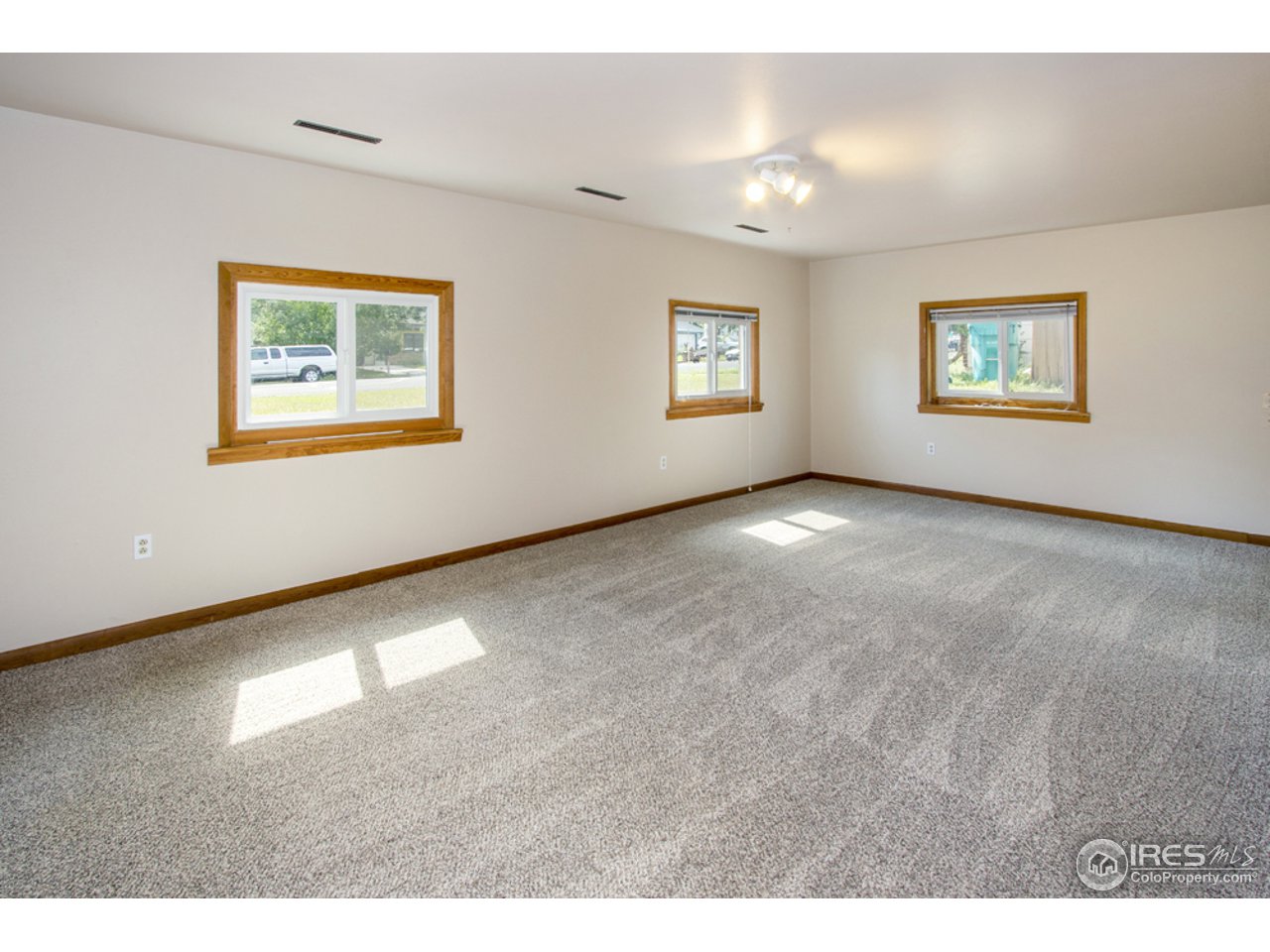 913 Rocky Road Fort Collins, CO 80521 - Photo 15 of 26 Spacious & bright family room