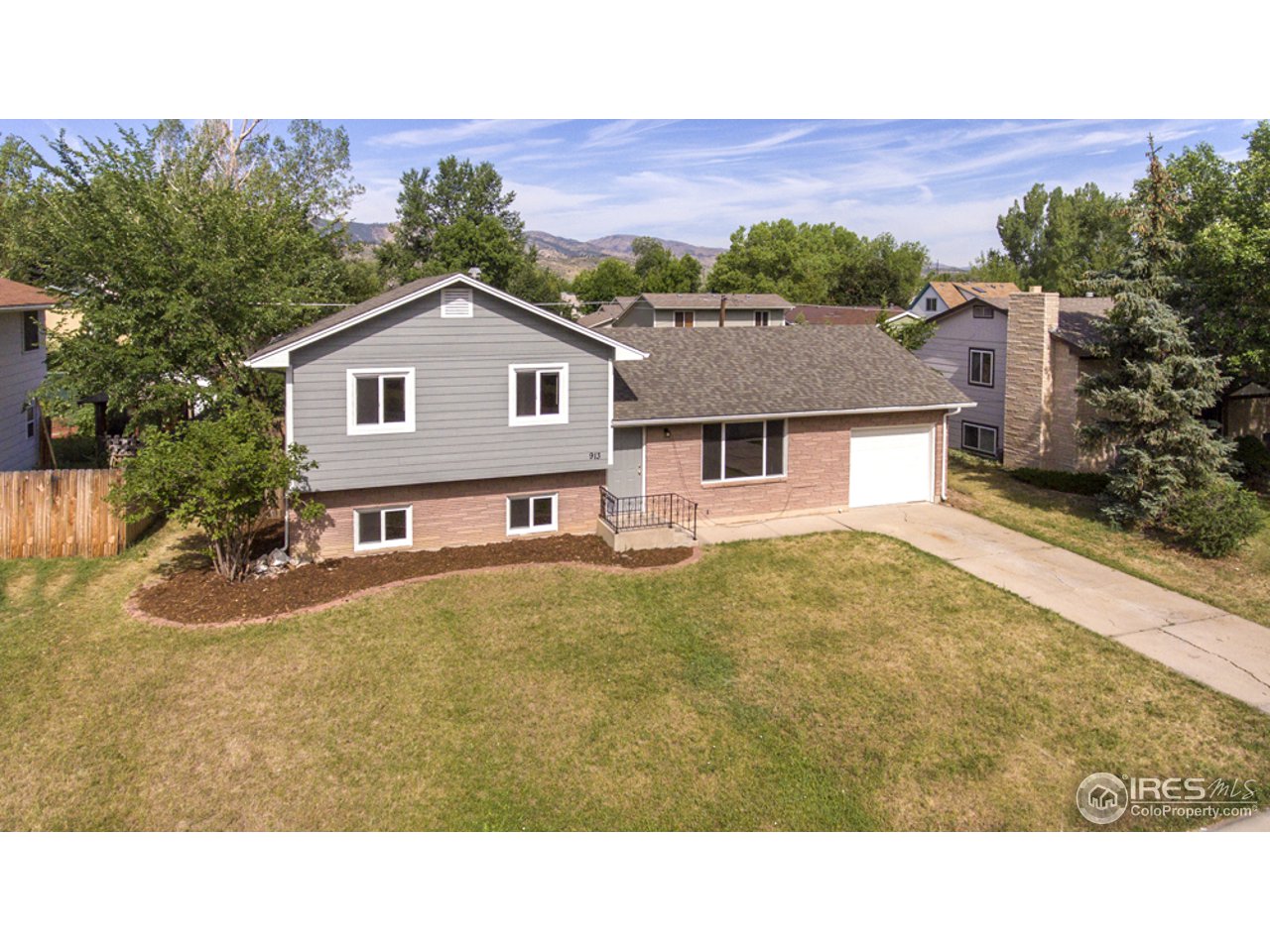 913 Rocky Road Fort Collins, CO 80521 - Photo 2 of 26 New Siding, windows & paint!