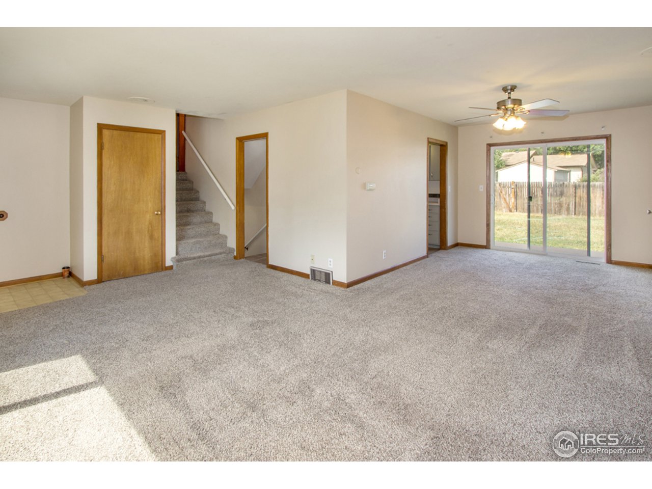913 Rocky Road Fort Collins, CO 80521 - Photo 8 of 26 Bright living room!