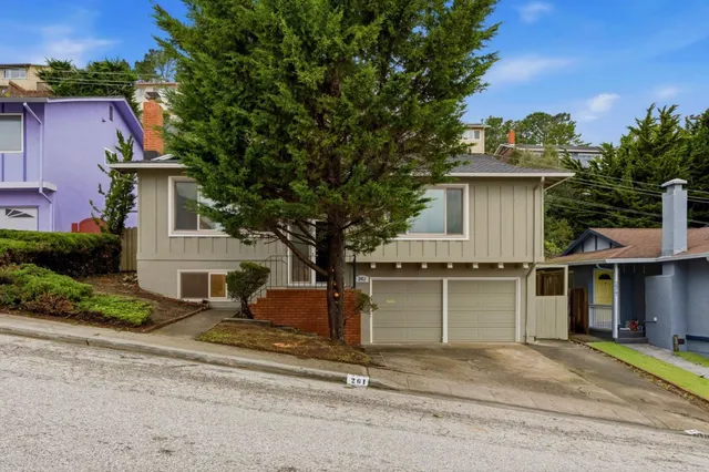 front view of a house with a street
