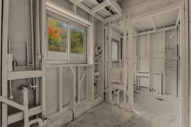 a aerial view of a house with a swimming pool yard and outdoor seating