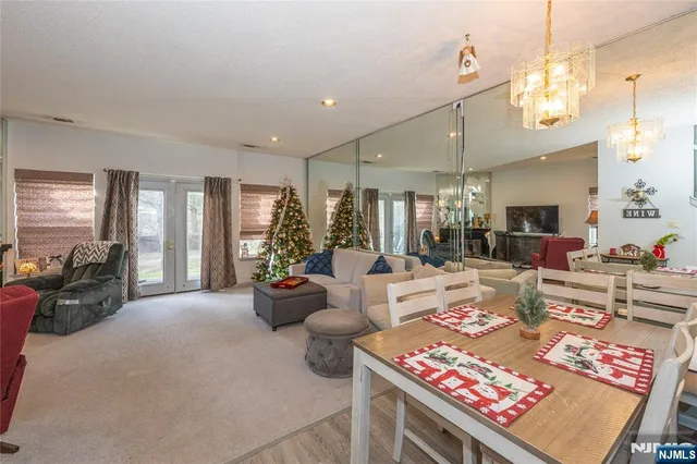a living room with furniture and a table