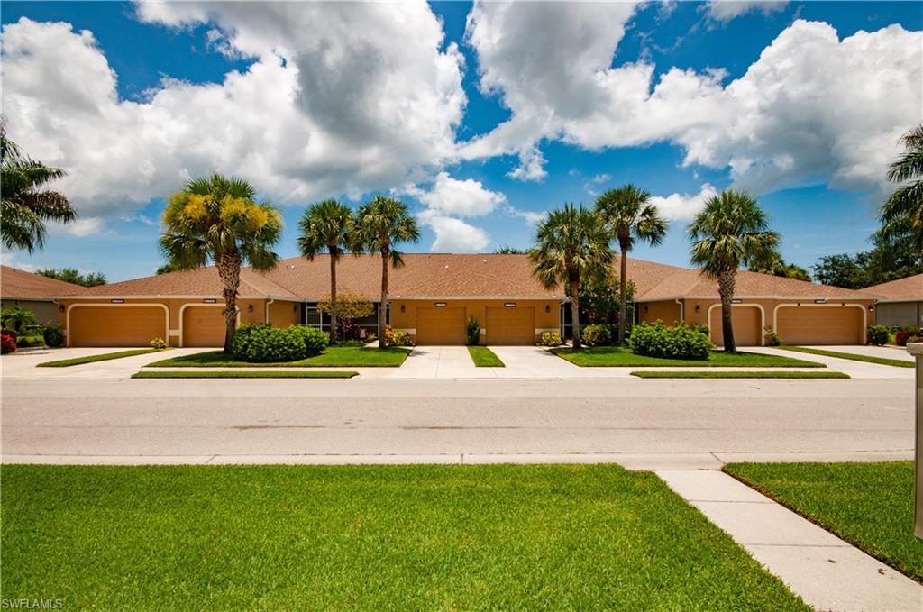 21520 Portrush Run Estero, FL 33928 - Photo 1 of 34 a view of a street