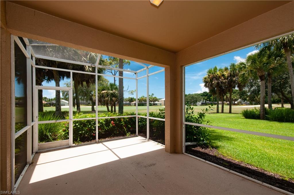 21520 Portrush Run Estero, FL 33928 - Photo 18 of 34 a view of a house with backyard and porch