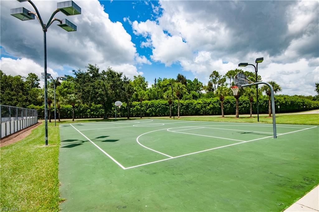 21520 Portrush Run Estero, FL 33928 - Photo 28 of 34 a view of a tennis court