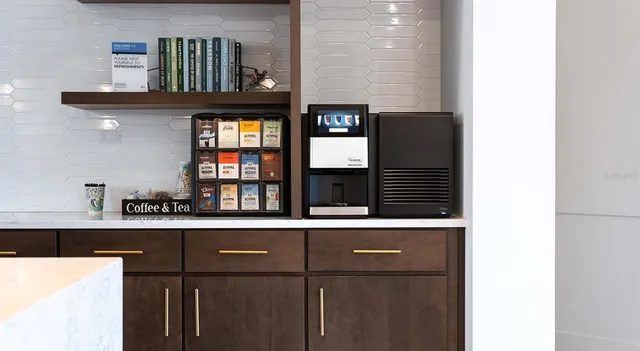 a view of a workspace with furniture