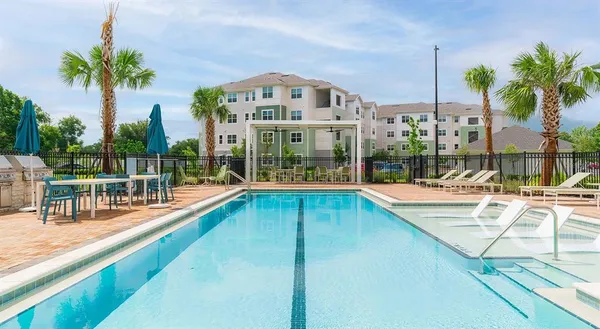 a view of a house with a swimming pool