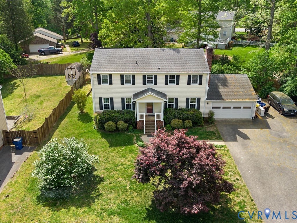 4411 Overridge Drive Chester, VA 23831 - Photo 2 of 35 an aerial view of a house with yard swimming pool and outdoor seating