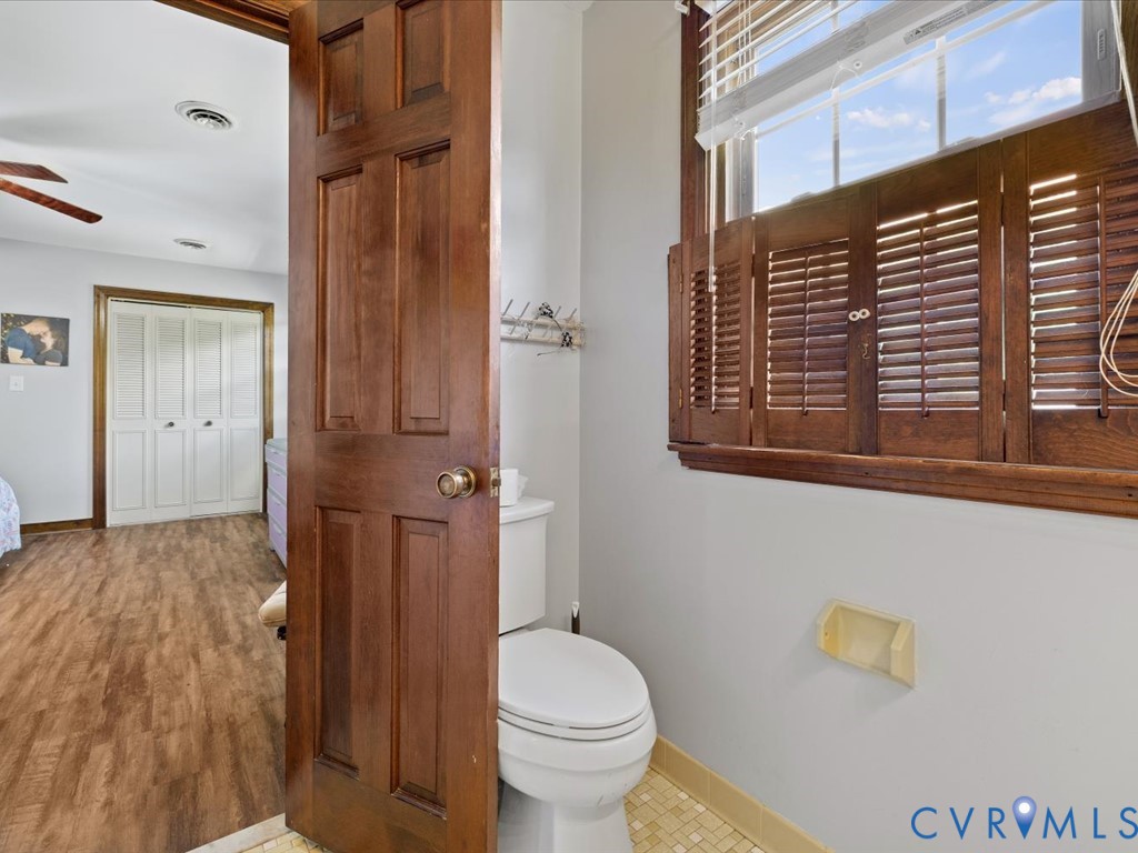 4411 Overridge Drive Chester, VA 23831 - Photo 24 of 35 a bathroom with a toilet and a shower