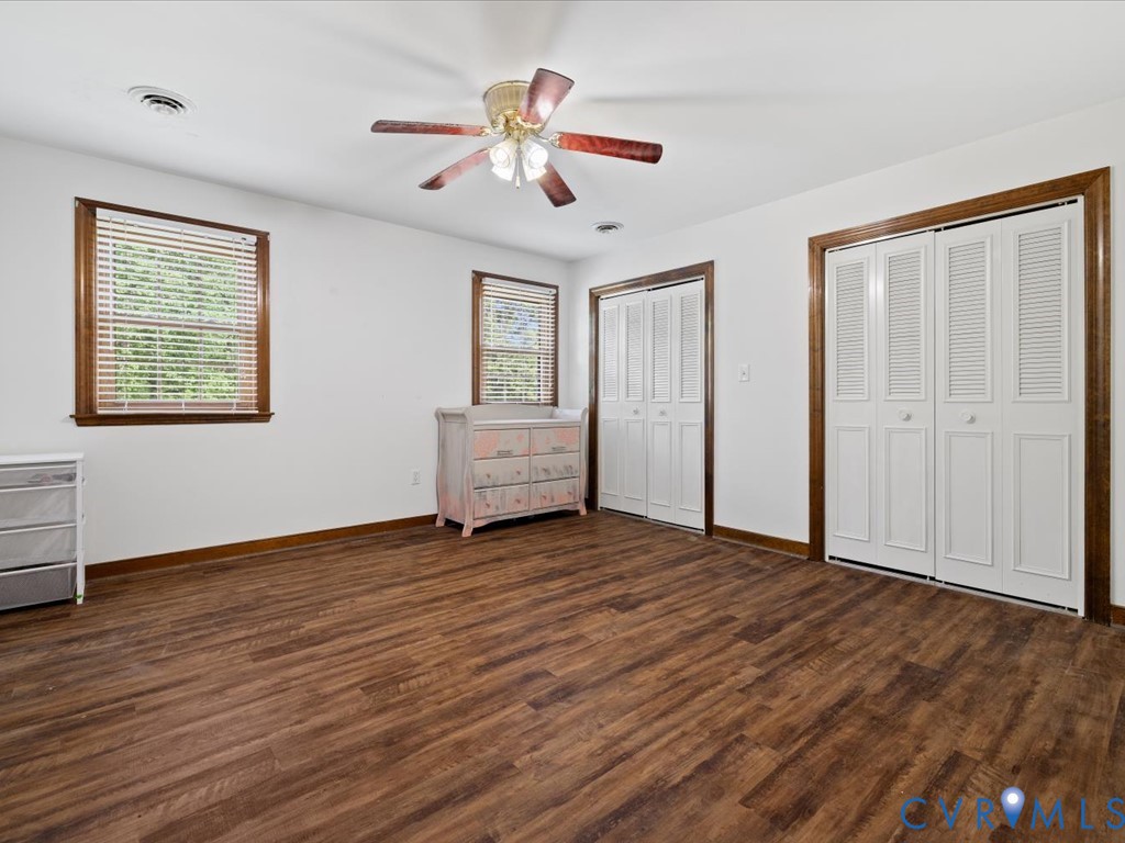 4411 Overridge Drive Chester, VA 23831 - Photo 27 of 35 a view of an empty room with wooden floor and a window