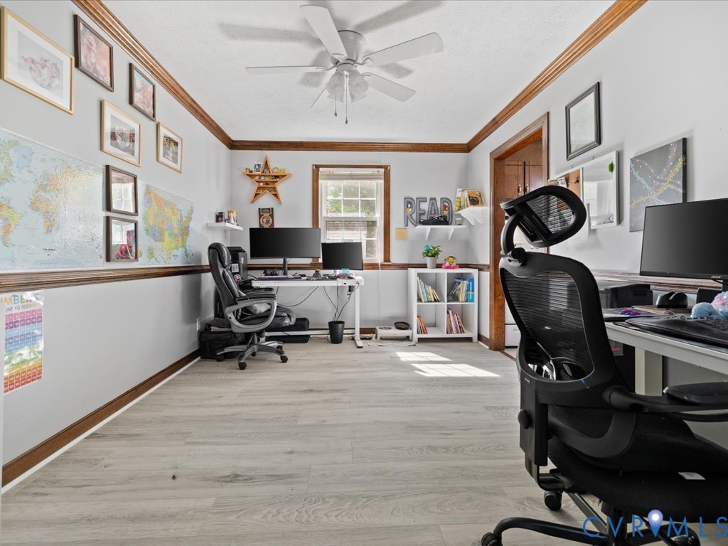 4411 Overridge Drive Chester, VA 23831 - Photo 10 of 35 a view of a workspace with furniture and a window