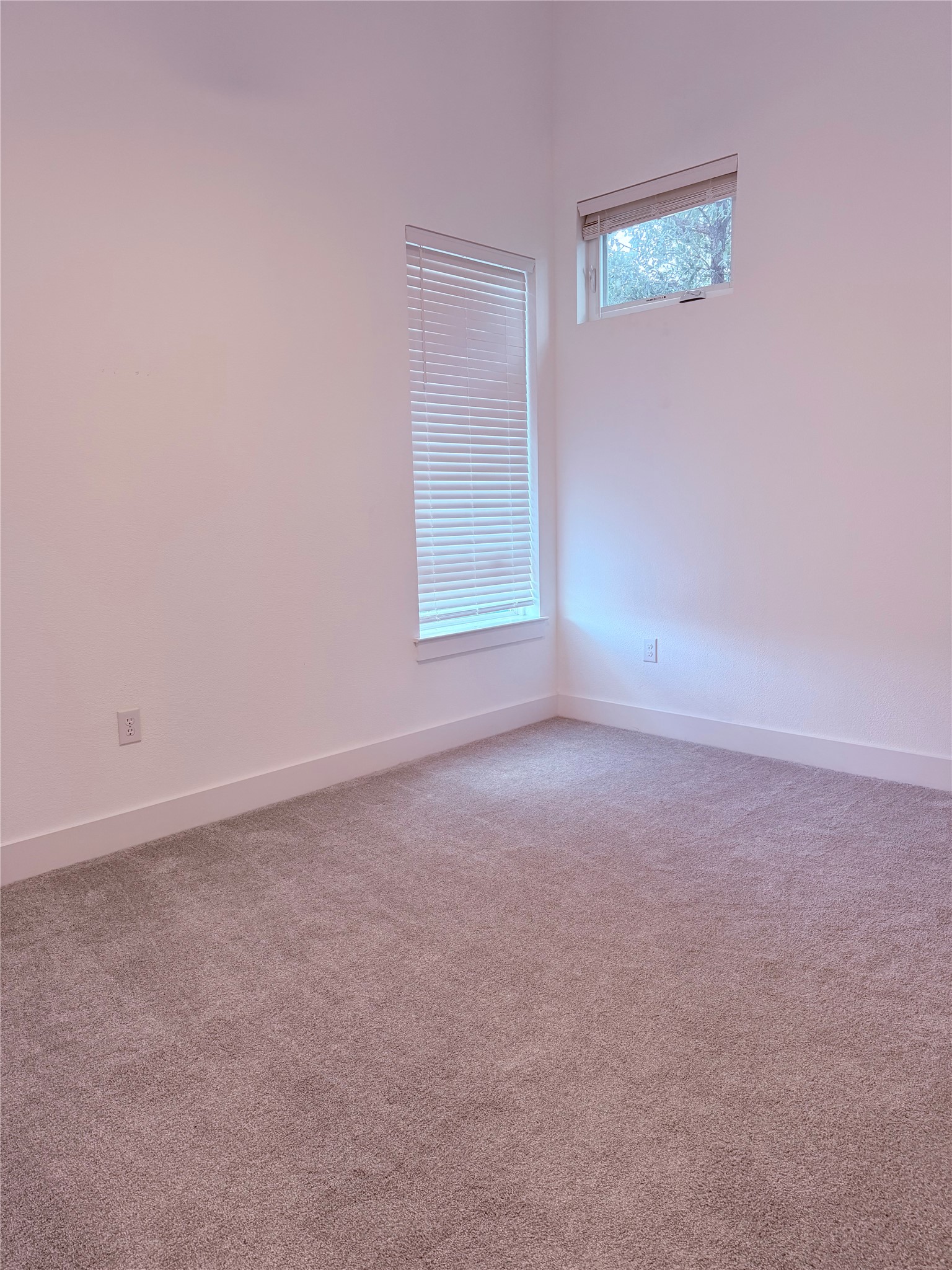1417 Kramer Lane, Unit 7 Austin, TX 78758 - Photo 7 of 24 High ceilings and ample light make for an airy and comfortable space.