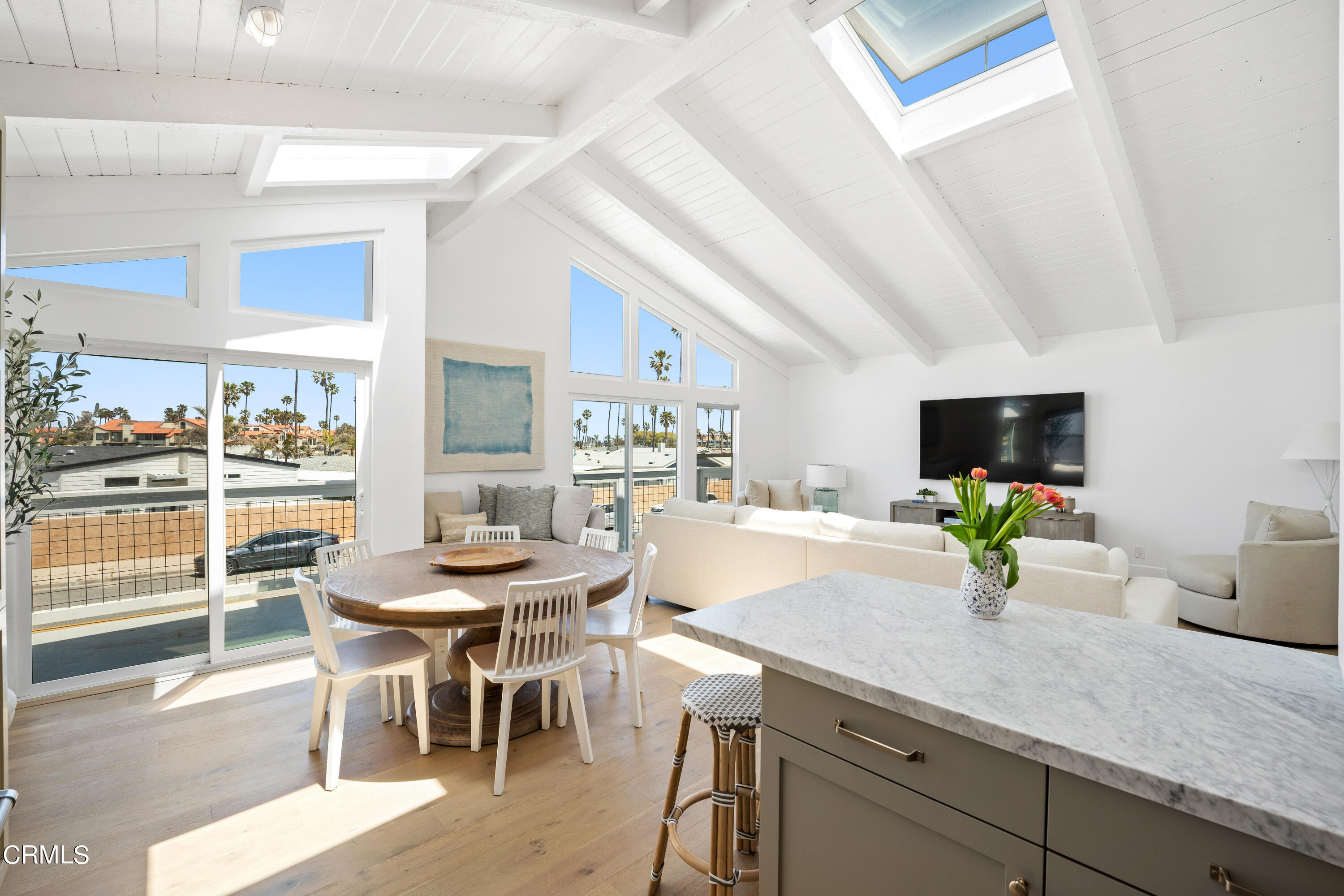 4169 Sunset Lane Oxnard, CA 93035 - Photo 23 of 56 a kitchen with a table and chairs in it