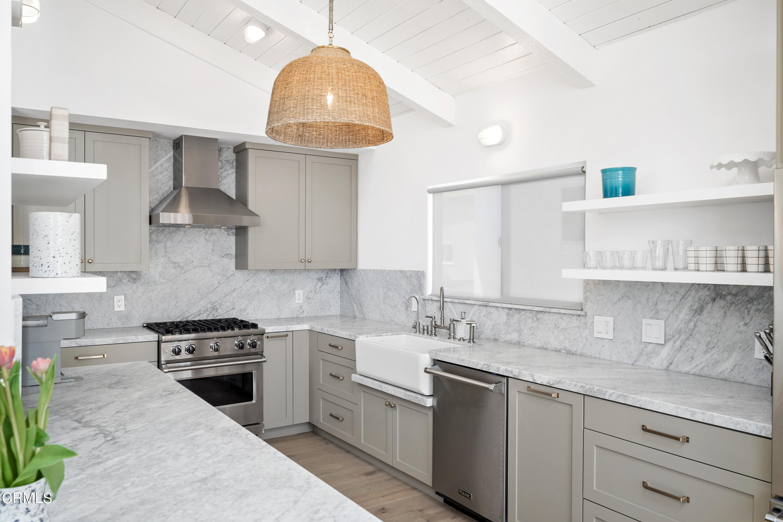 4169 Sunset Lane Oxnard, CA 93035 - Photo 24 of 56 a kitchen with stainless steel appliances a sink stove and cabinets