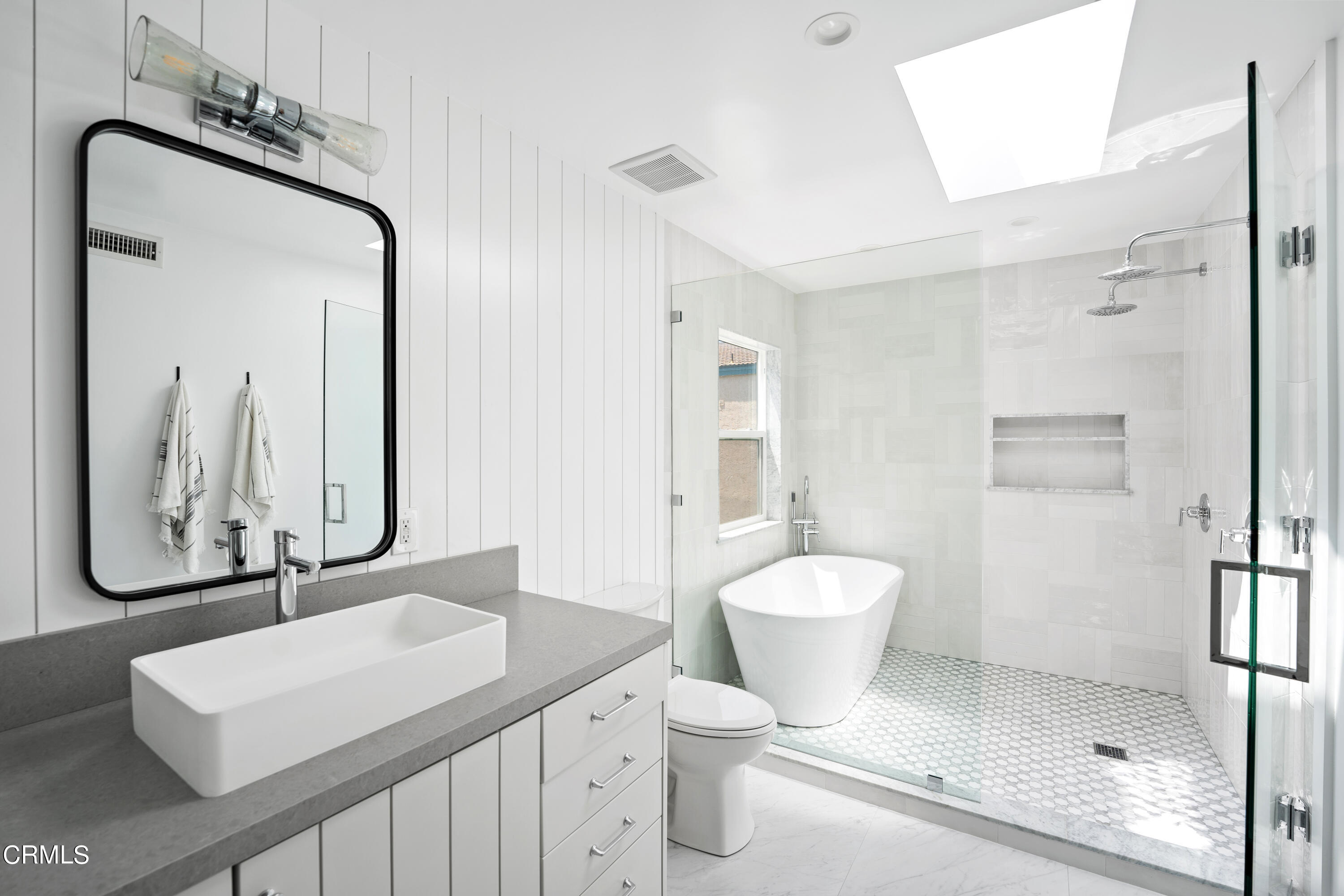 4169 Sunset Lane Oxnard, CA 93035 - Photo 30 of 56 a bathroom with a toilet a sink and mirror