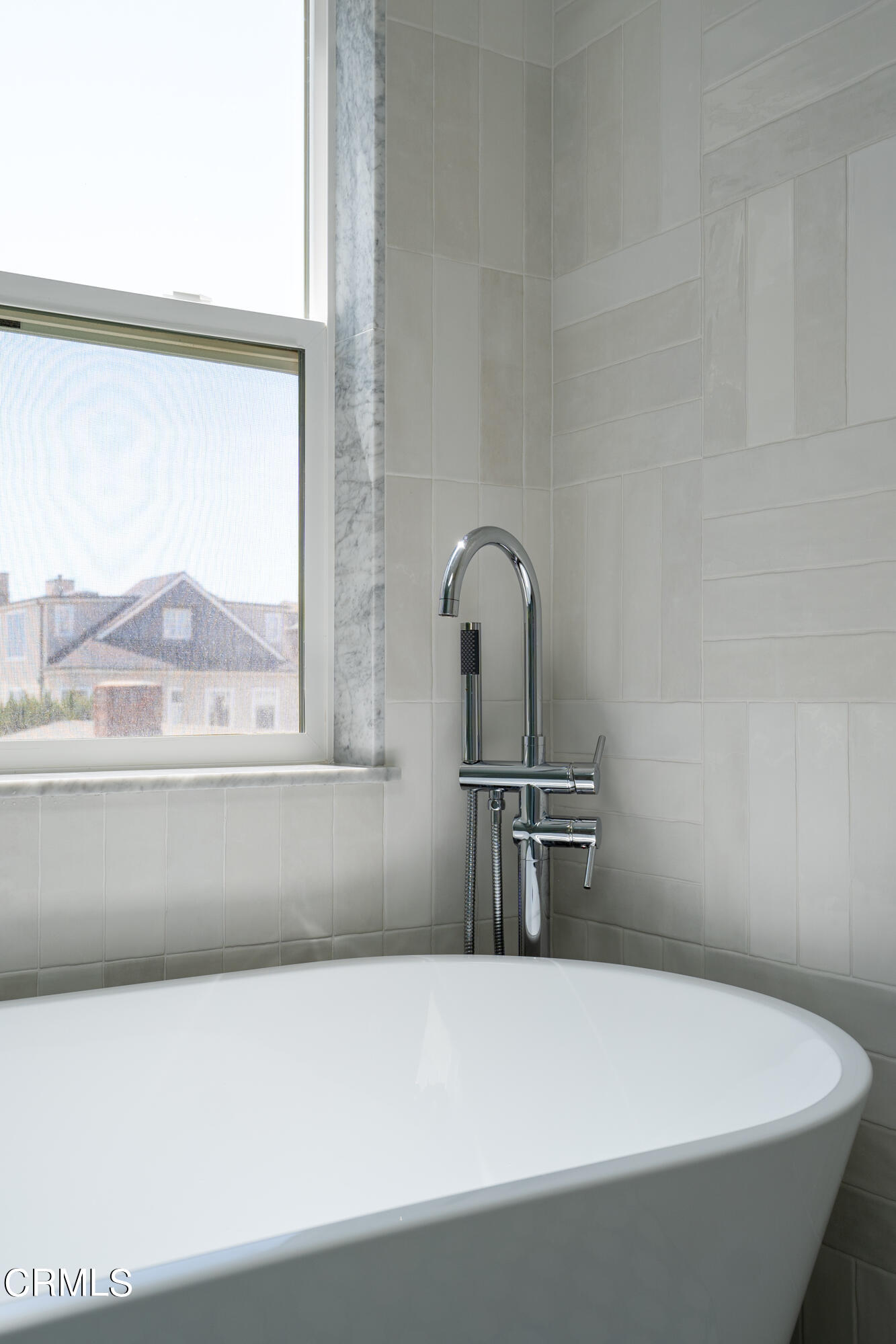 4169 Sunset Lane Oxnard, CA 93035 - Photo 33 of 56 a bathroom with a bathtub