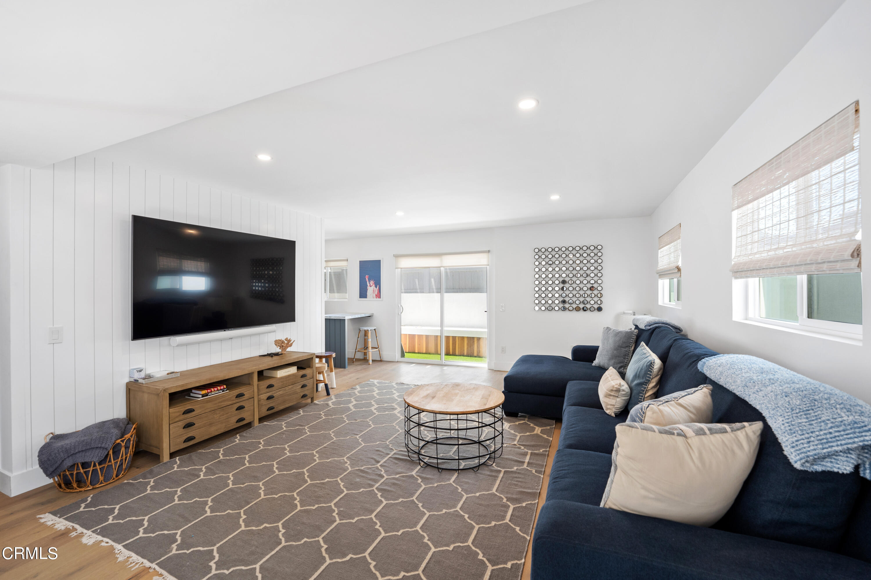 4169 Sunset Lane Oxnard, CA 93035 - Photo 34 of 56 a living room with furniture and a flat screen tv