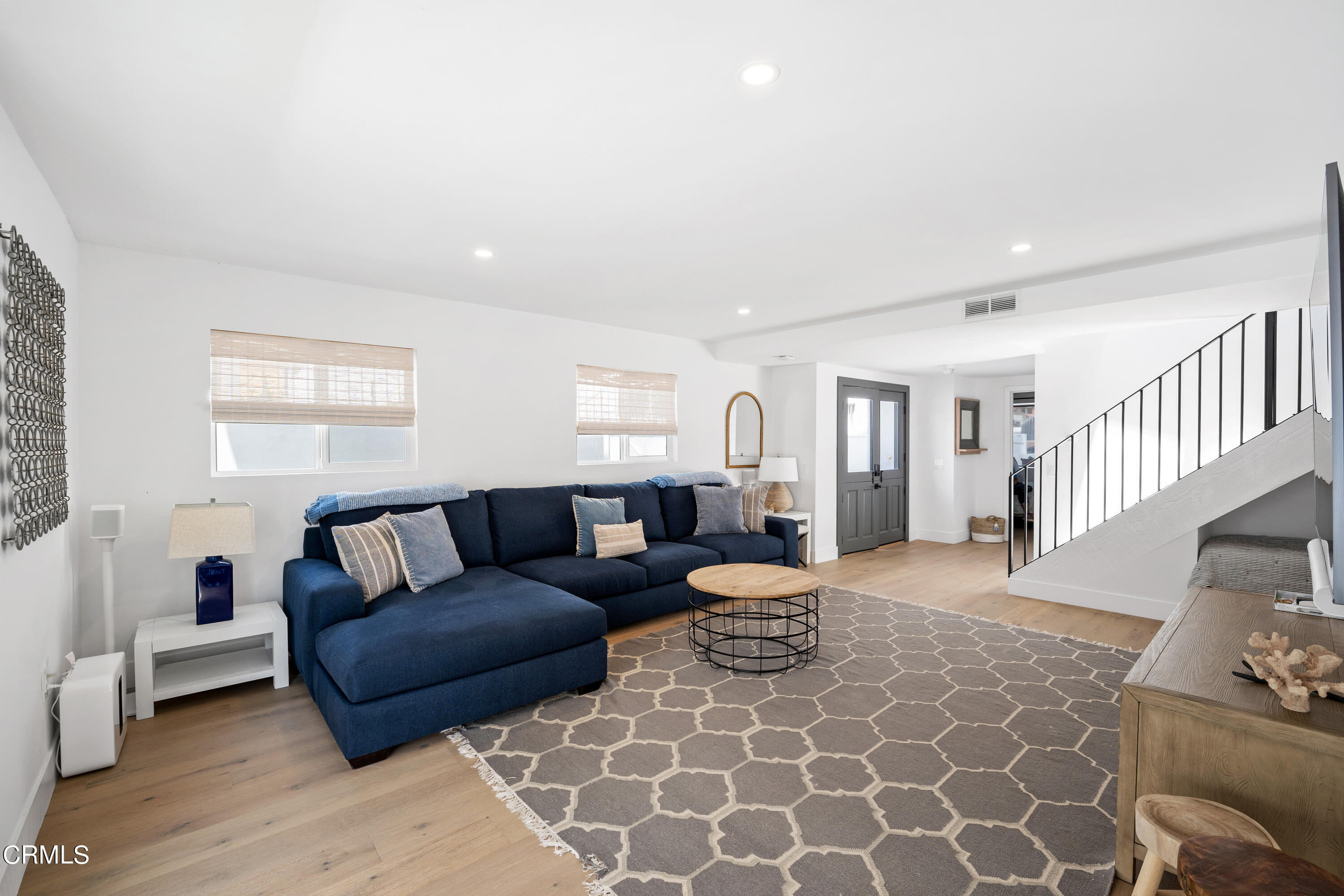 4169 Sunset Lane Oxnard, CA 93035 - Photo 38 of 56 a living room with furniture and wooden floor
