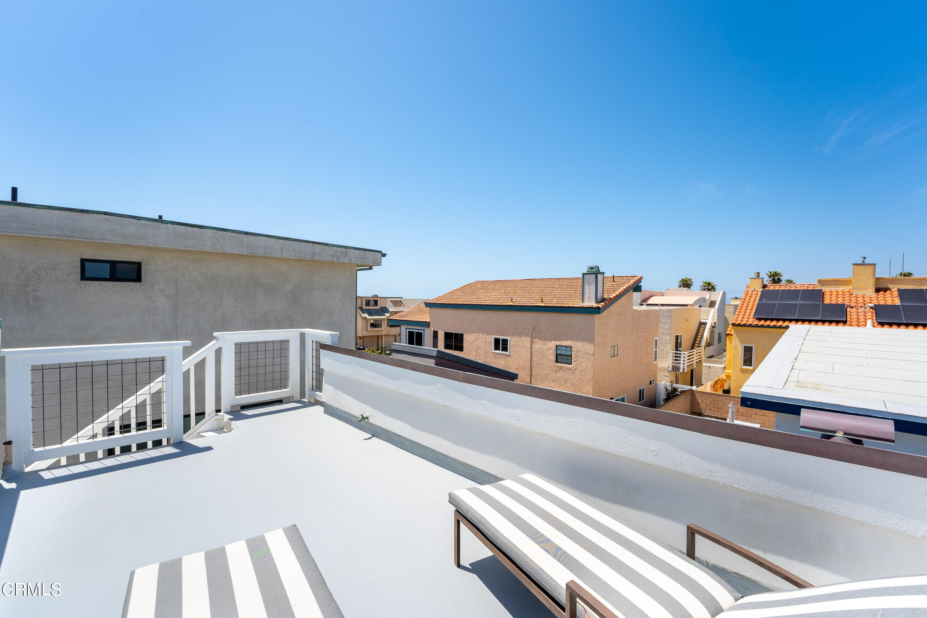 4169 Sunset Lane Oxnard, CA 93035 - Photo 42 of 56 a view of a balcony with an outdoor seating
