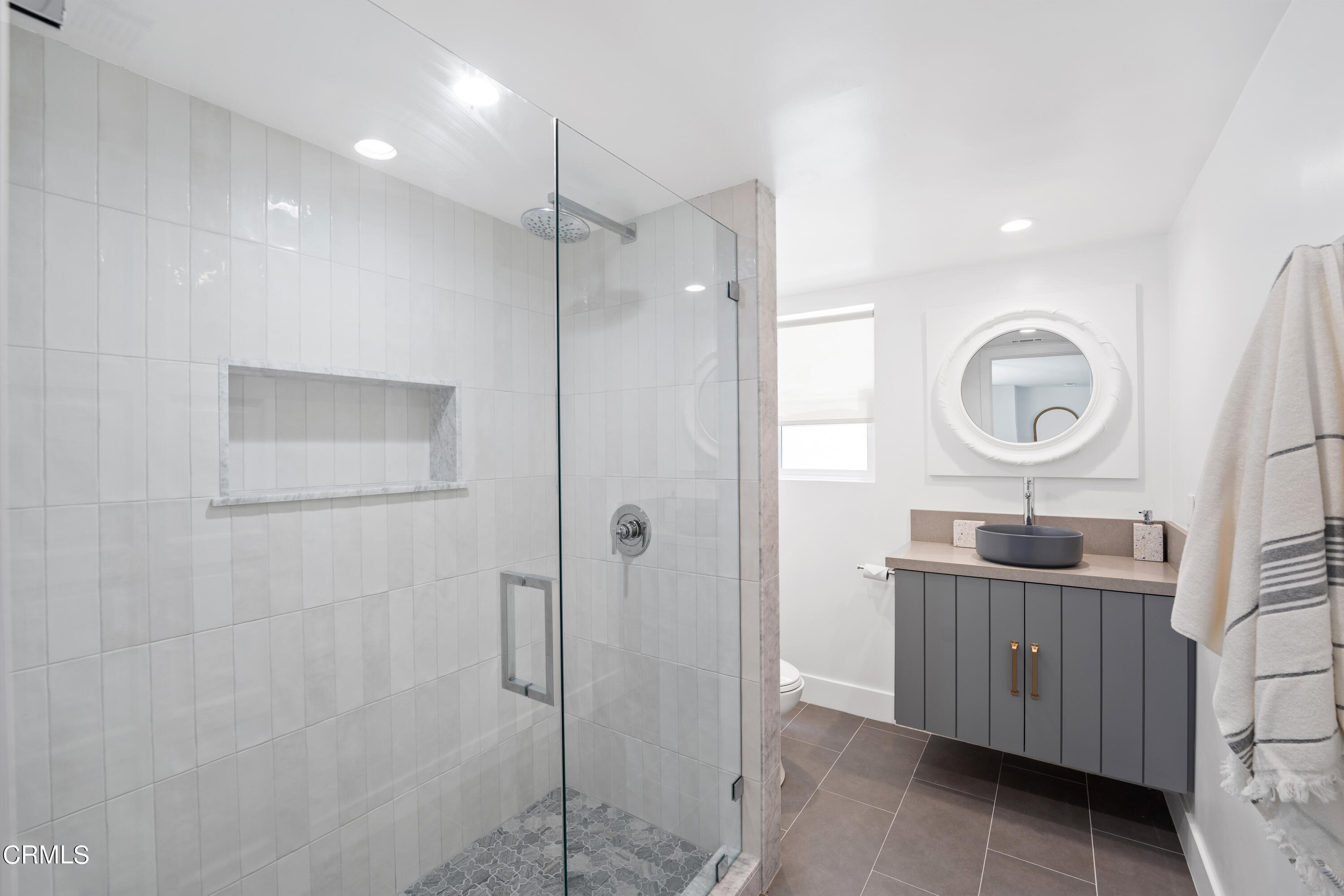 4169 Sunset Lane Oxnard, CA 93035 - Photo 43 of 56 a bathroom with a granite countertop sink a mirror and shower