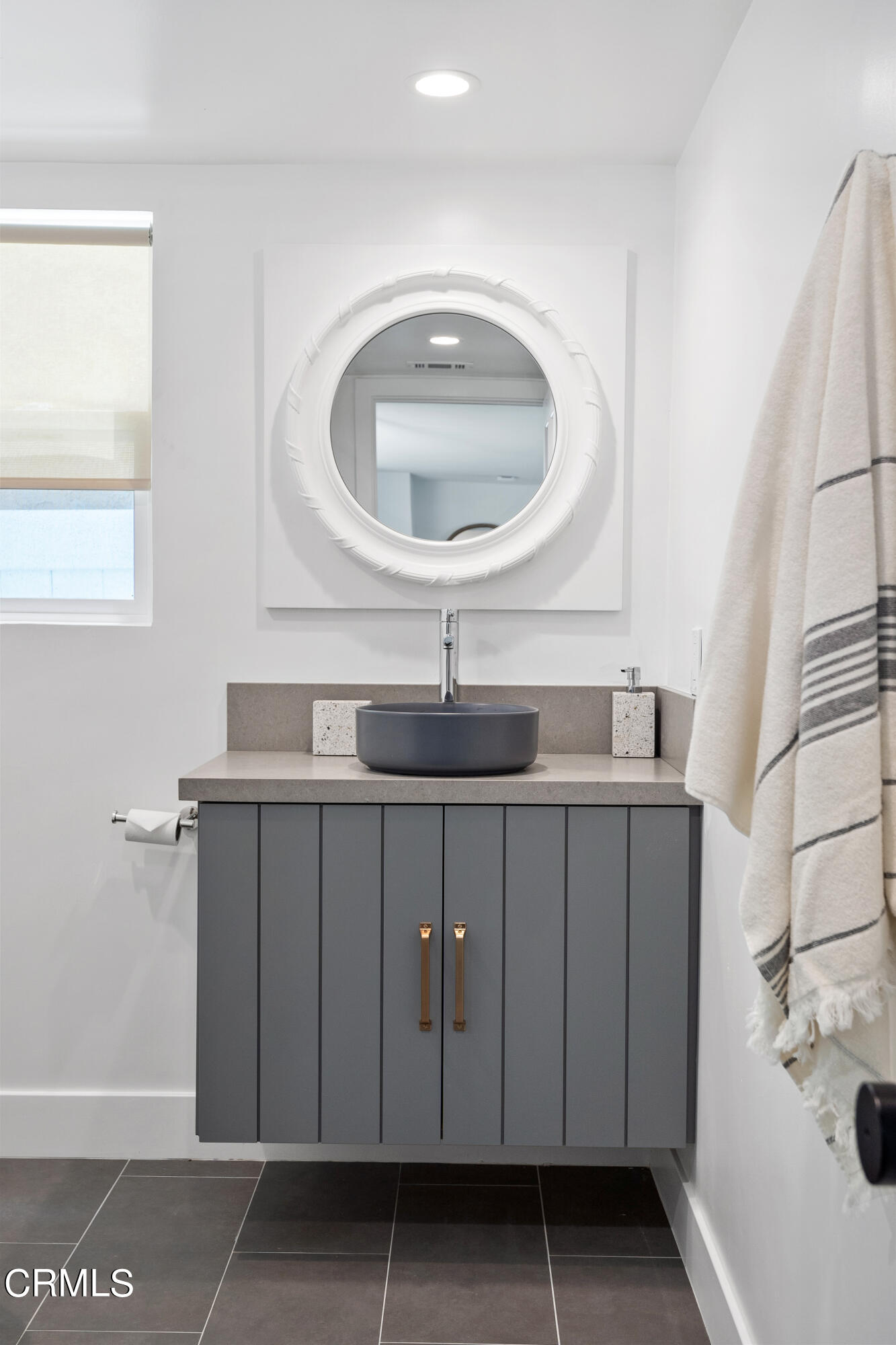 4169 Sunset Lane Oxnard, CA 93035 - Photo 44 of 56 a sink with a mirror