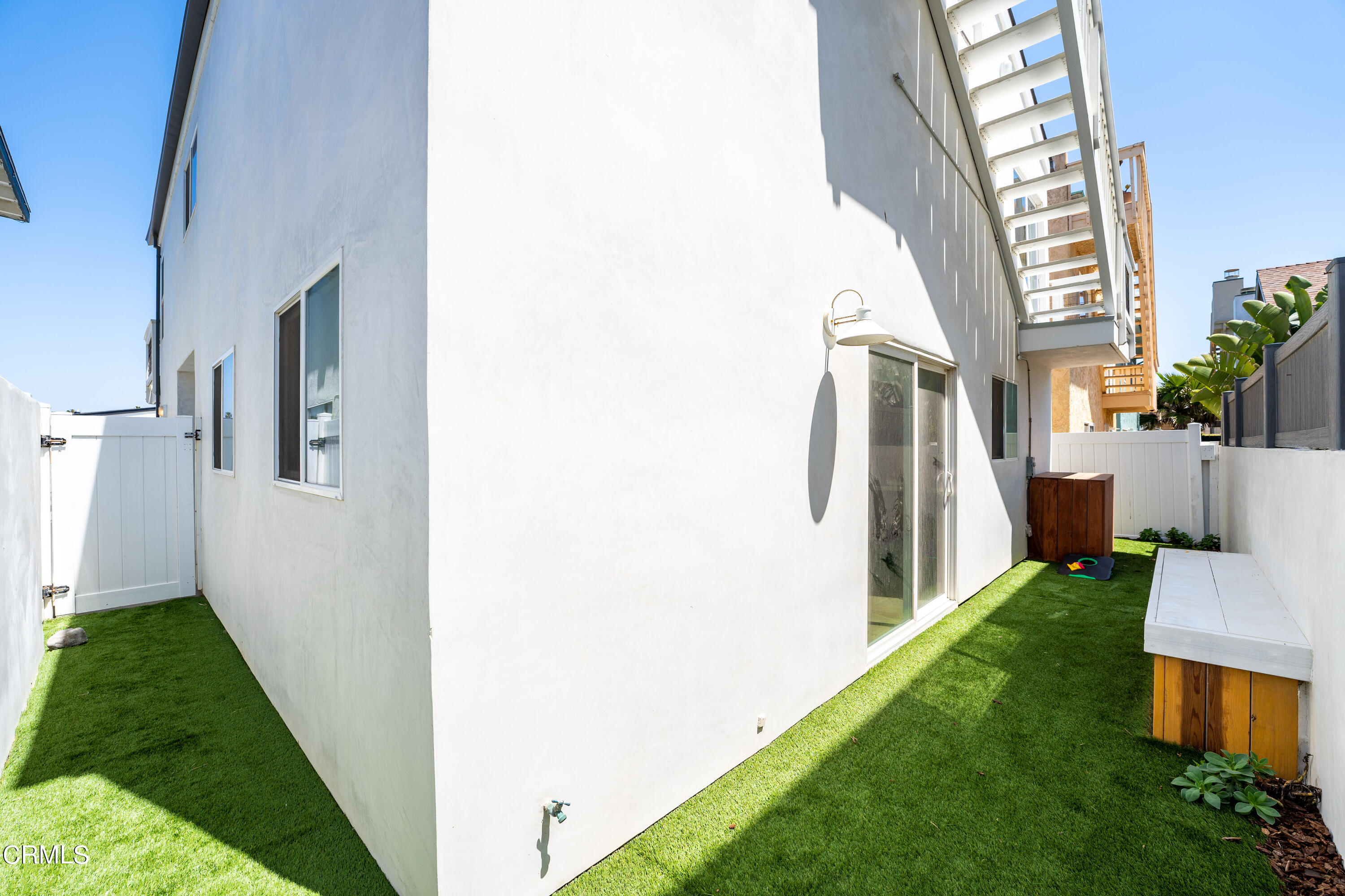 4169 Sunset Lane Oxnard, CA 93035 - Photo 50 of 56 a view of an entryway with a house