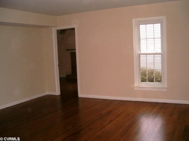 5506 Chanson Road Richmond, VA 23237 - Photo 2 of 12 Den/Family/Great Room - Pic 1 - Family Room freshly painted, Wood Flooring Re-Finished, and New Tilt-In Thermal Windows
