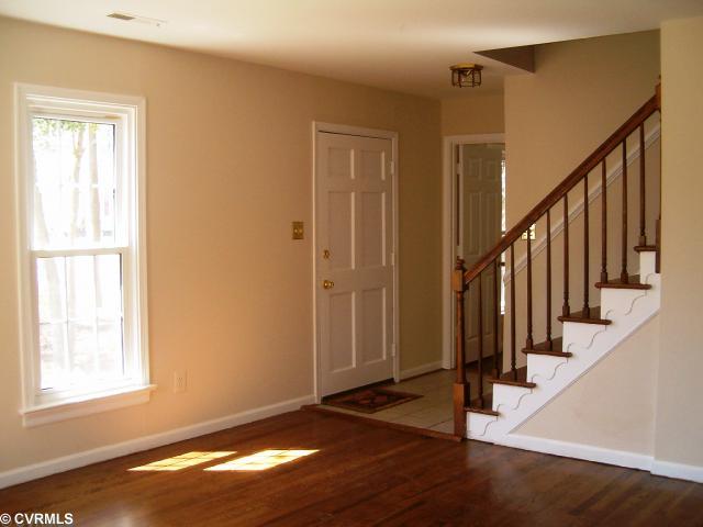 5506 Chanson Road Richmond, VA 23237 - Photo 4 of 12 Den/Family/Great Room - Pic 3 - Family Rm with wood flooring refinished, walls freshly painted, Ceramic Tile at Front Door & Coat Closet.