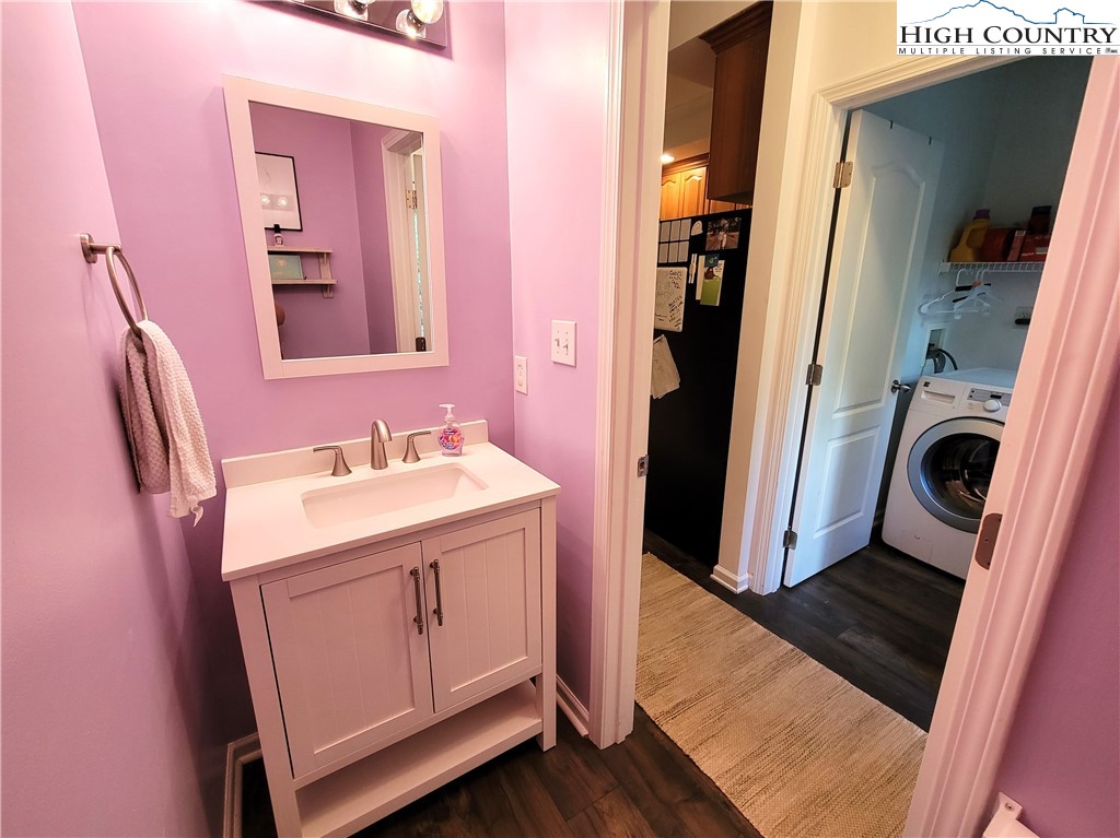 107 Stratford Lane, Unit 24B Boone, NC 28607 - Photo 21 of 45 a bathroom with a sink and a mirror