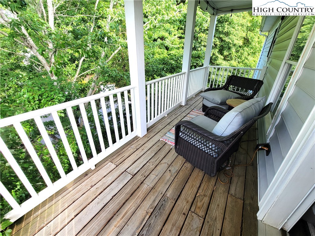 107 Stratford Lane, Unit 24B Boone, NC 28607 - Photo 28 of 45 a view of balcony with wooden floor