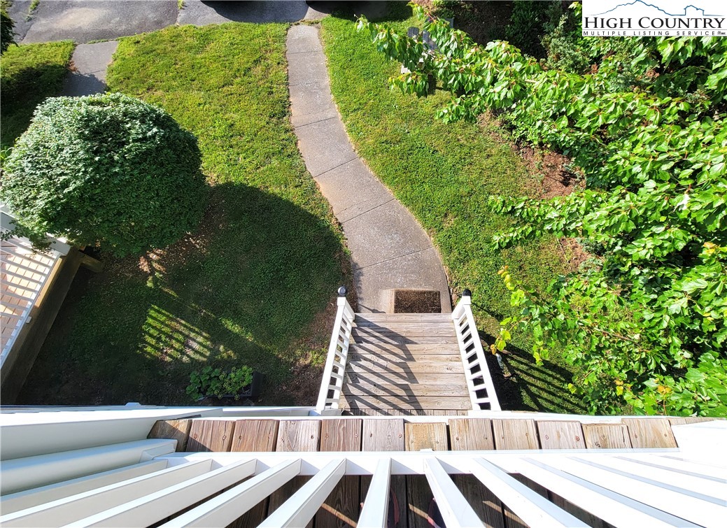 107 Stratford Lane, Unit 24B Boone, NC 28607 - Photo 30 of 45 a view of balcony with wooden floor