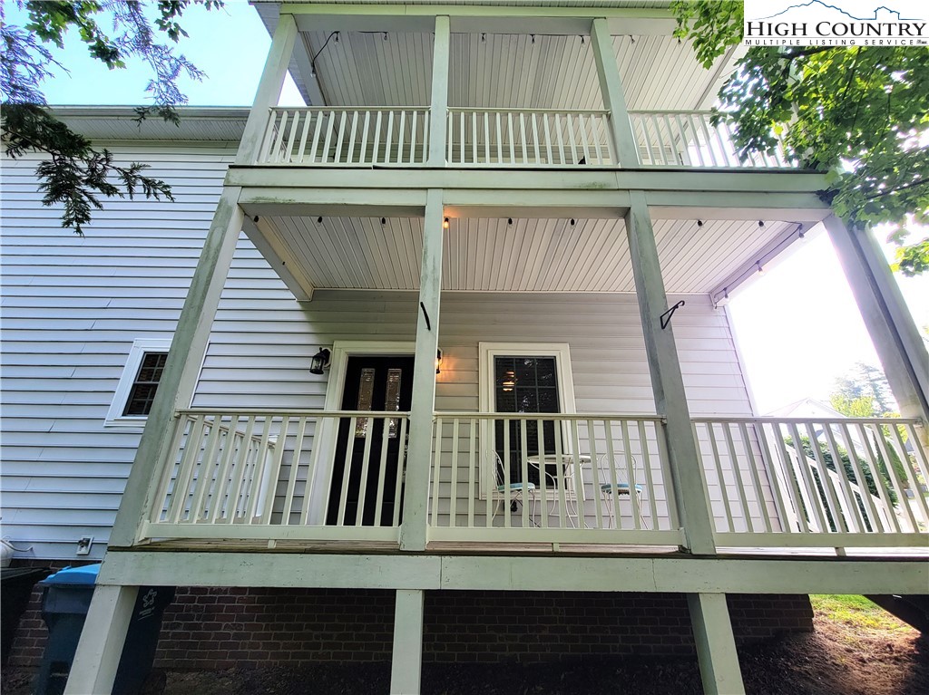 107 Stratford Lane, Unit 24B Boone, NC 28607 - Photo 44 of 45 a view of a house with a deck