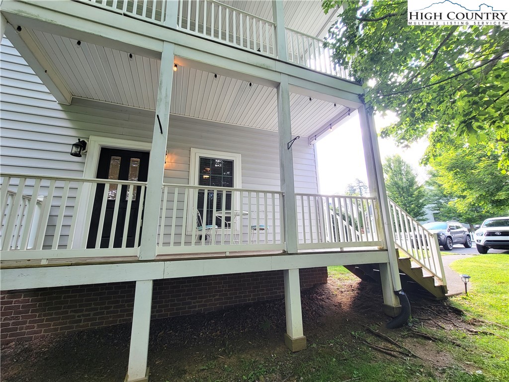 107 Stratford Lane, Unit 24B Boone, NC 28607 - Photo 45 of 45 a view of a house with a wooden deck