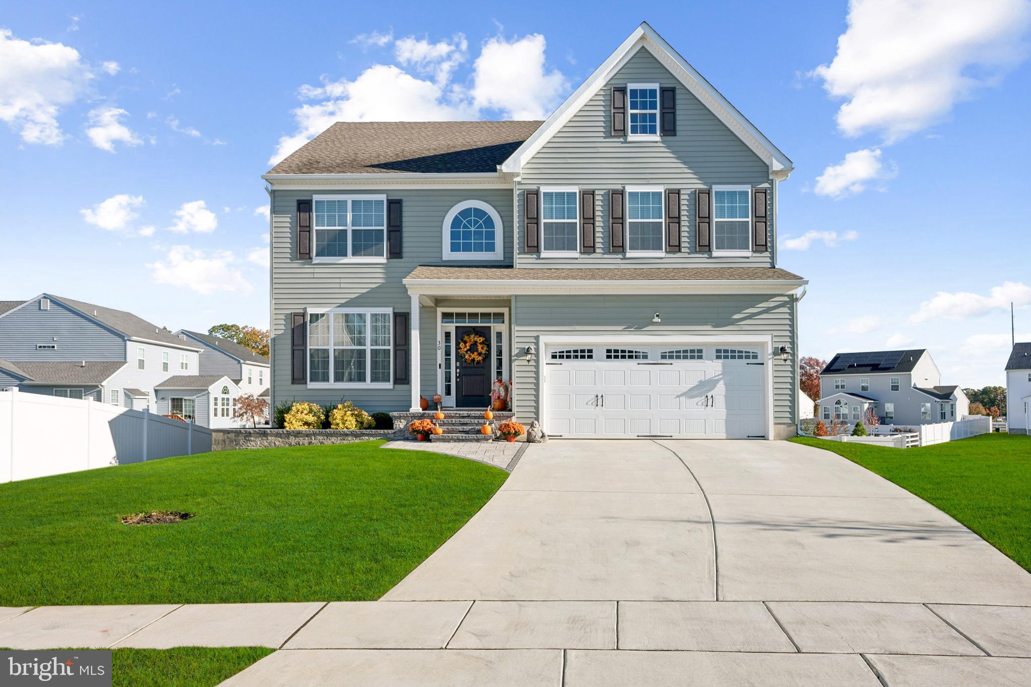 30 Champlain Road Marlton, NJ 08053 - Photo 1 of 30 a front view of a house with a yard and garage