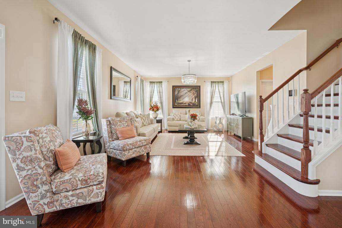30 Champlain Road Marlton, NJ 08053 - Photo 11 of 30 a living room with furniture and a wooden floor