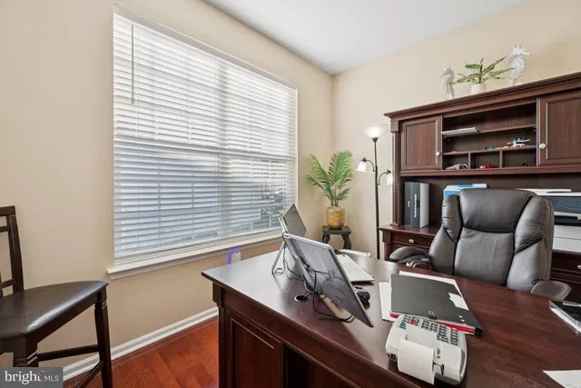 a room with furniture and a window