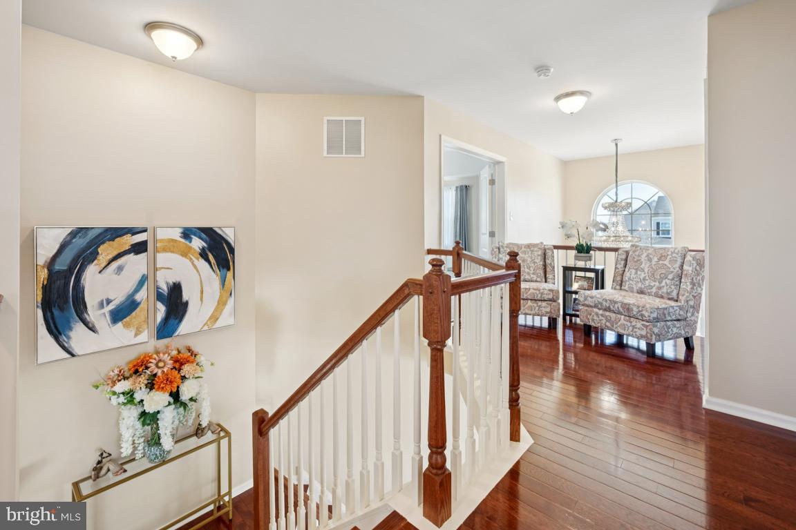 30 Champlain Road Marlton, NJ 08053 - Photo 16 of 30 a view of entryway with wooden floor and stairs